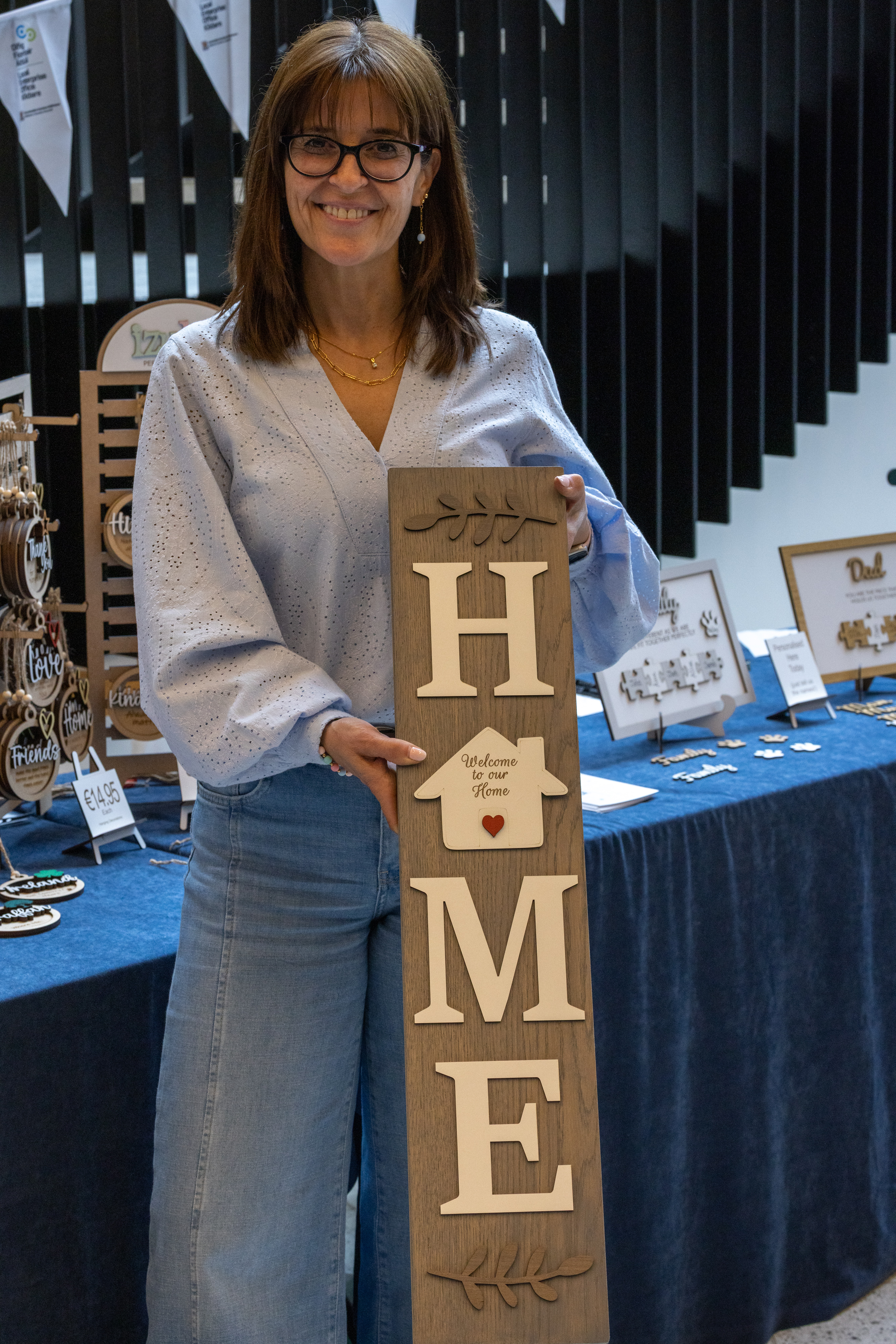 Person with craft sign. 